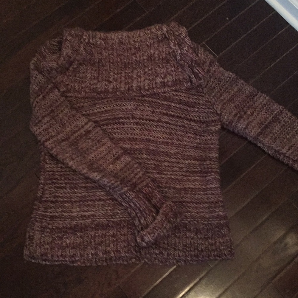 Cowl Neck sweater with cuffed sleeves.